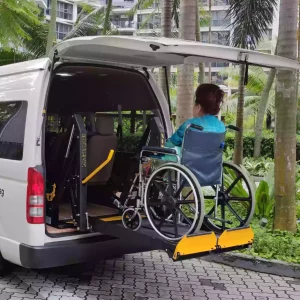 toyota hiace hiroof maxi cab wheelchair transport wheelchair user on a hydraulic lift
