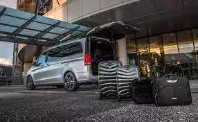 singapore maxi cab airport transfer changi airport picture showing a mercedes viano just unloaded luggage